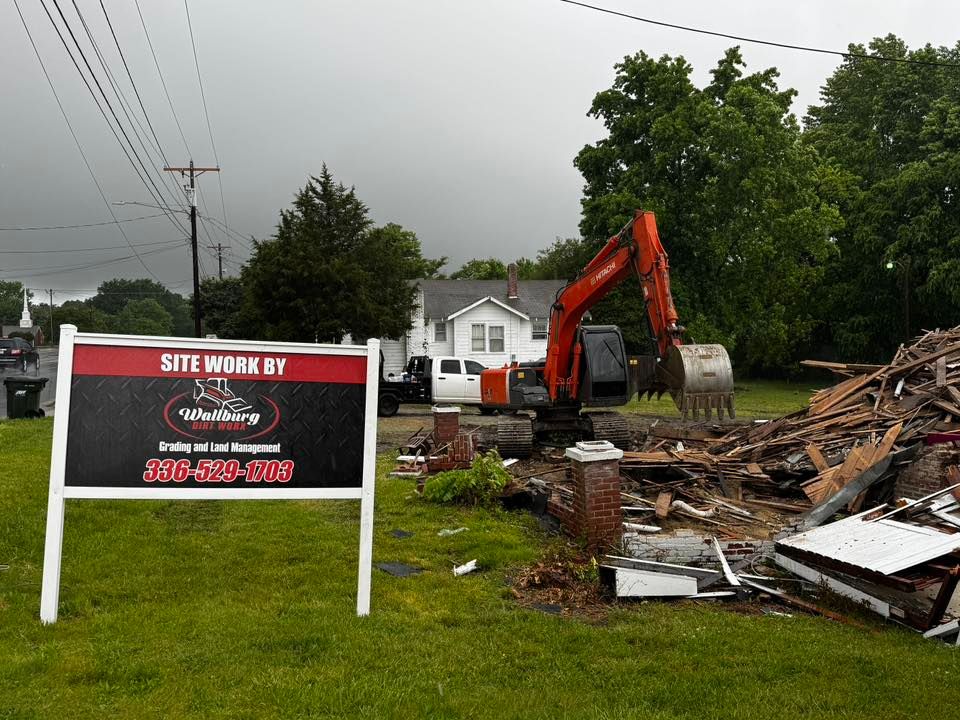 Wallburg Dirt Worx job sign at an active home demolition