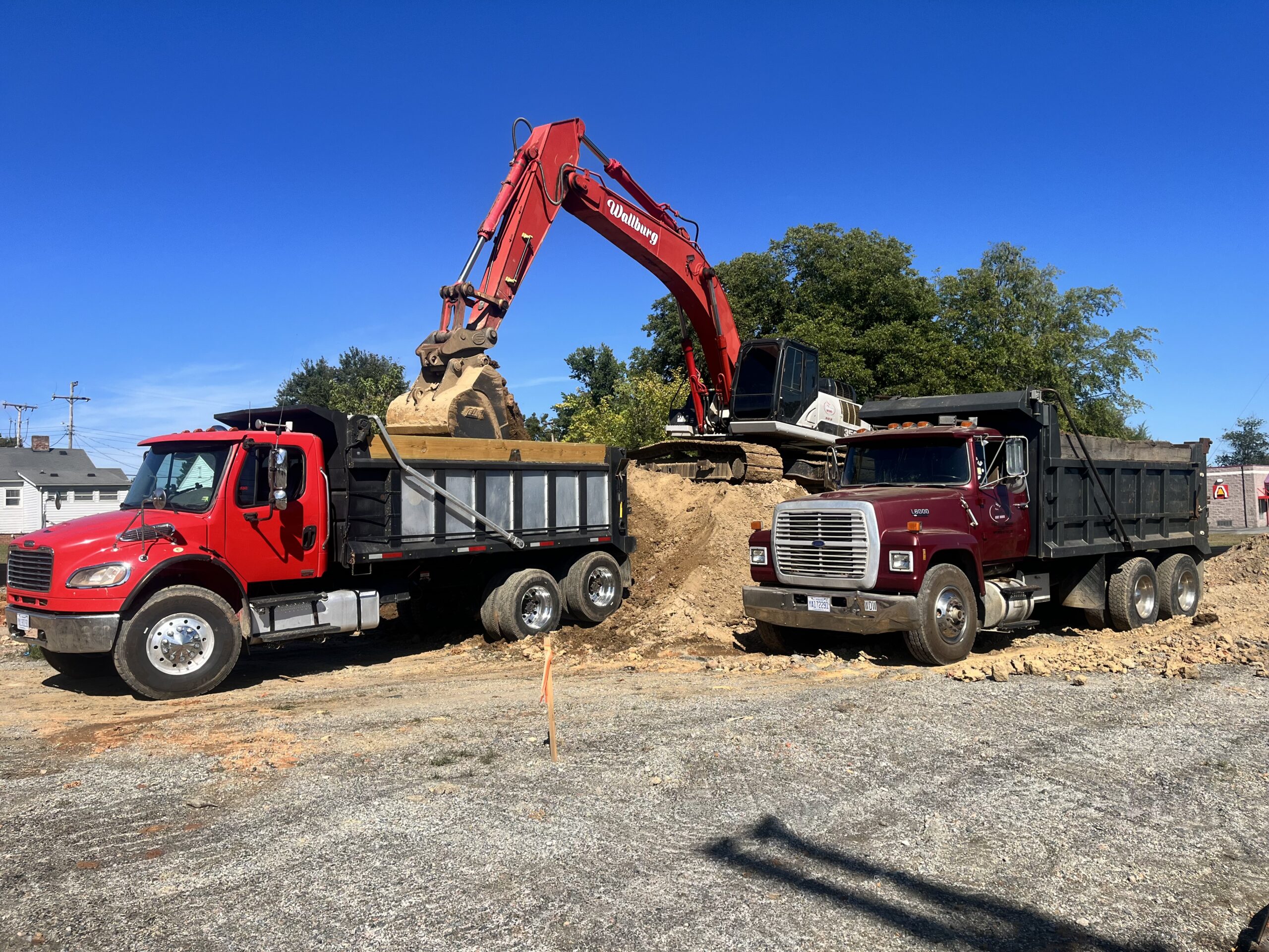 Wallburg Dirt Worx dump truck loaded on a Triad job site