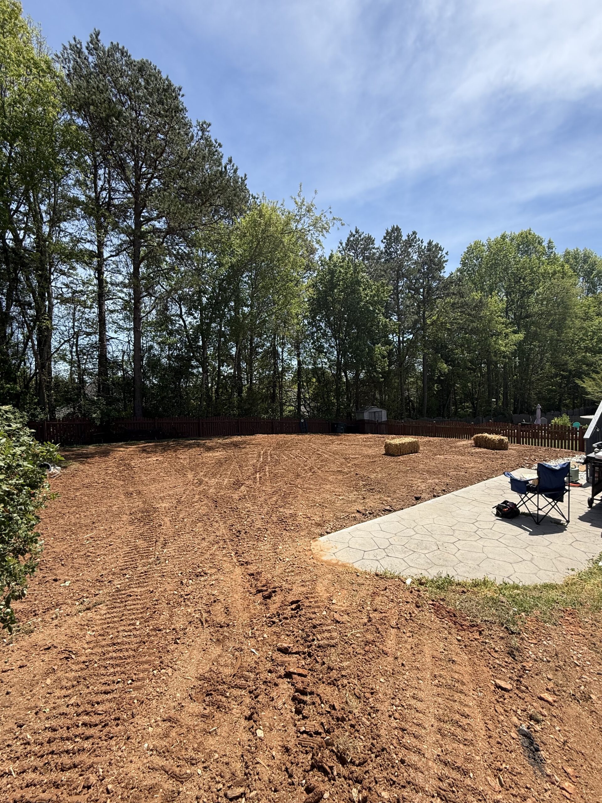 Pool removed, the hole backfilled and the ground graded level